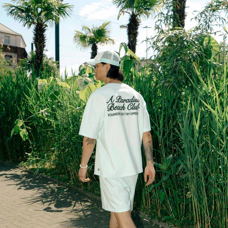 Pequs A Paradise Beach Club Back Logo T-Shirt Jubiläumsangebot