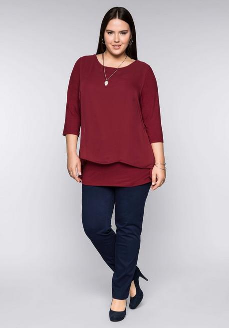 sheego Blusenshirt in leichter A-Linie mit Zipfelsaum - rubinrot sheego Fabrikverkauf